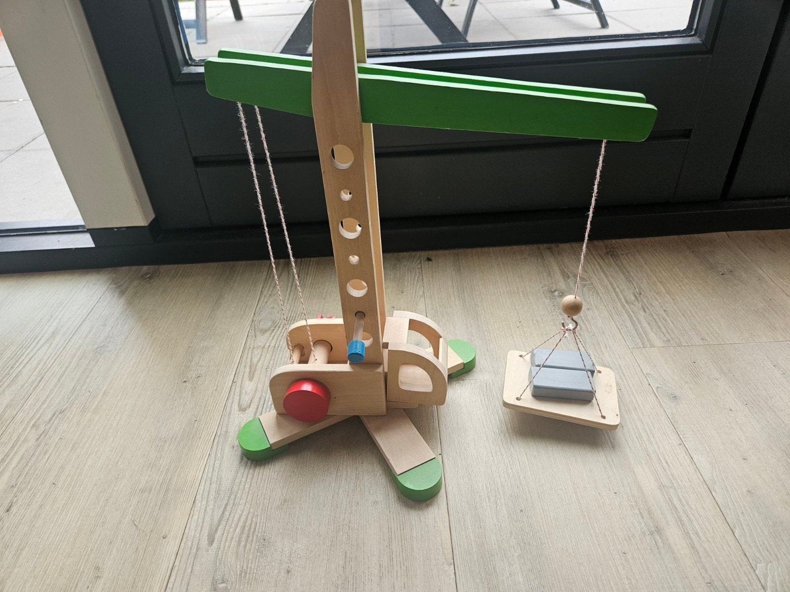 houten hijskraan, Ophalen, Gebruikt