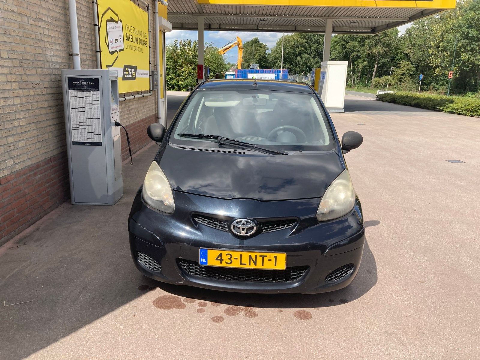 Toyota Aygo 1.0 12V Vvt-i 5DRS 2010 Zwart, Auto's, Toyota, Voorwielaandrijving, Origineel Nederlands, Handgeschakeld, Grijs