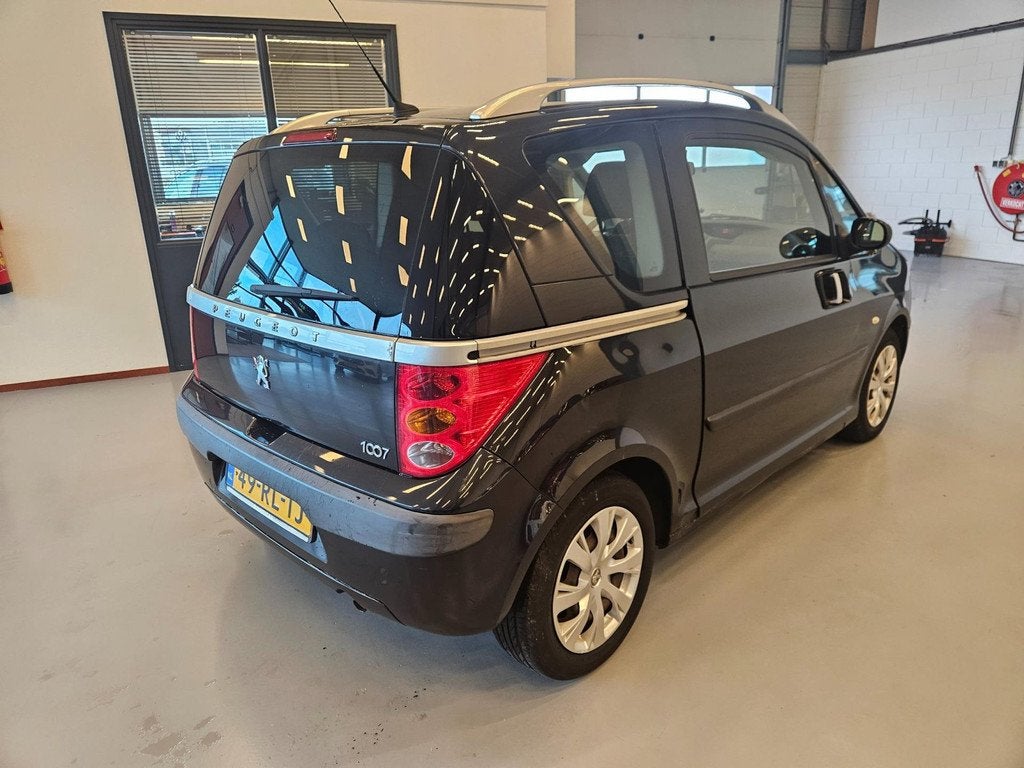 Peugeot 1007 Gentry Automaat | Slechts 76.514 KM | Airco | U, Auto's, Peugeot, 4 cilinders, 4 stoelen, Origineel Nederlands, Bedrijf