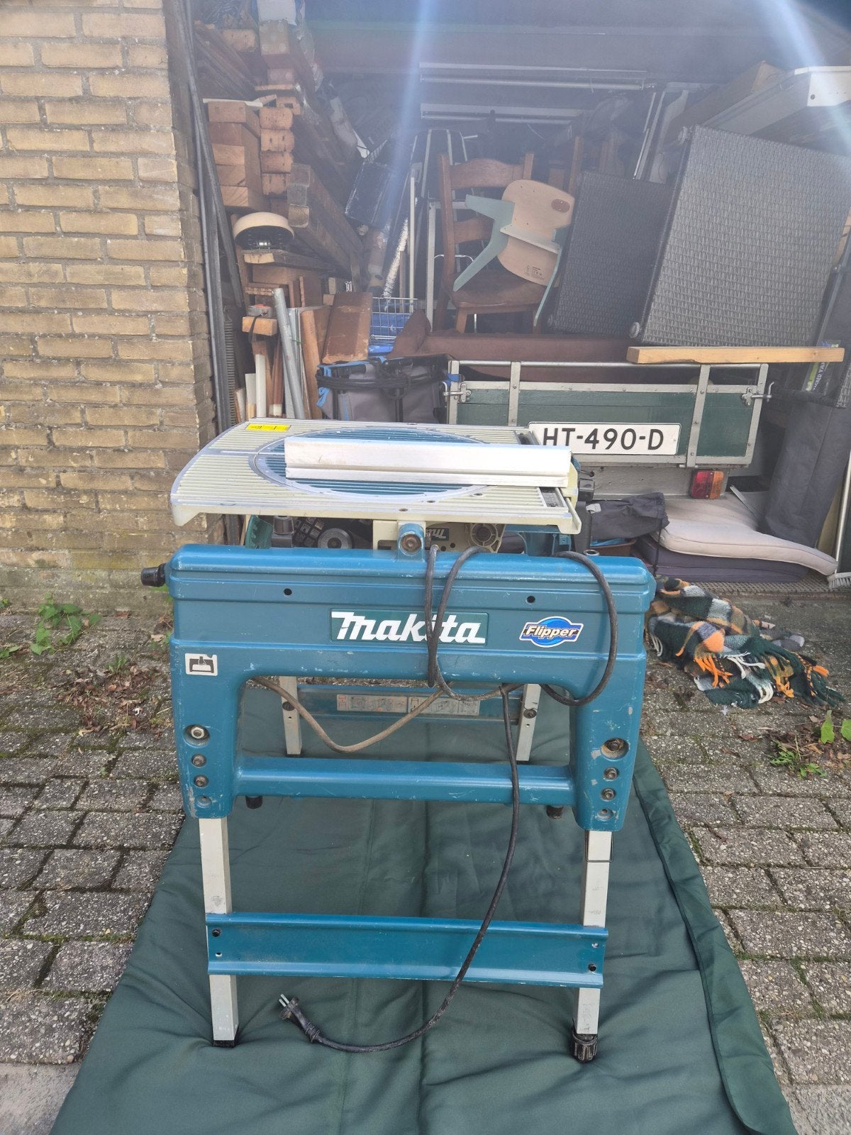 Makitta flipover zaagmachine, Ophalen, Gebruikt, Inklapbaar