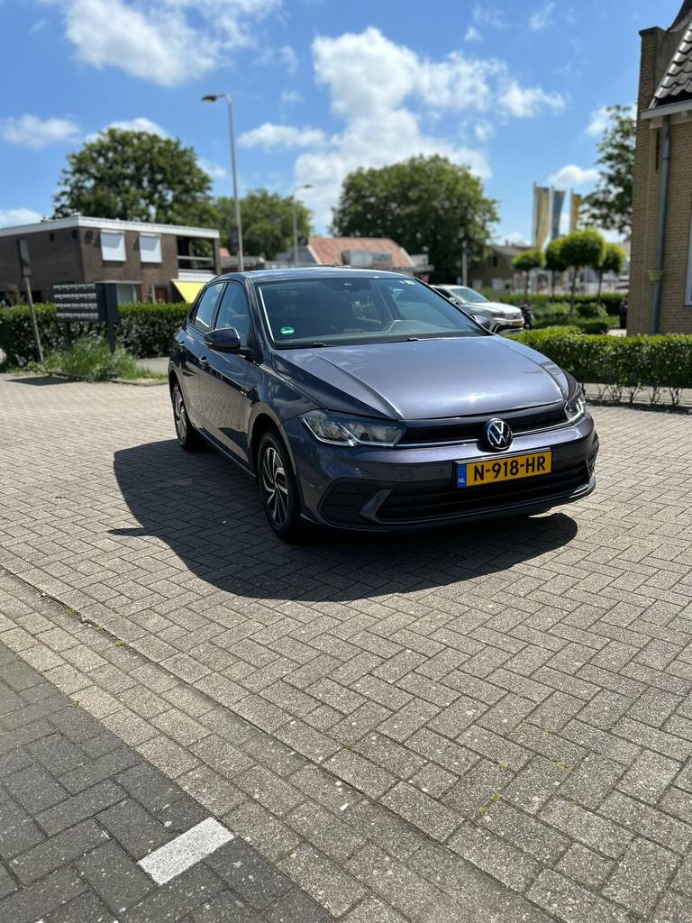 Volkswagen Polo 1.0 TSI 95pk 2021 Grijs, Voorwielaandrijving, 1072 kg, Origineel Nederlands, Bedrijf