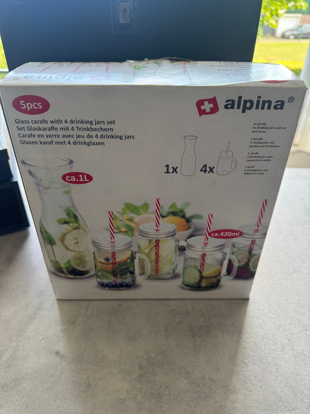 Alpina Glazen karaf met 4 drinkglazen - Nieuw, Glas, Nieuw, Ophalen of Verzenden, Meerkleurig