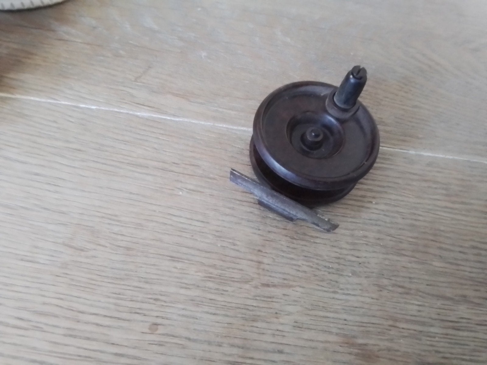 een vintage vliegvissen reel  bakeliet  nr1, Ophalen of Verzenden, Gebruikt, Molen