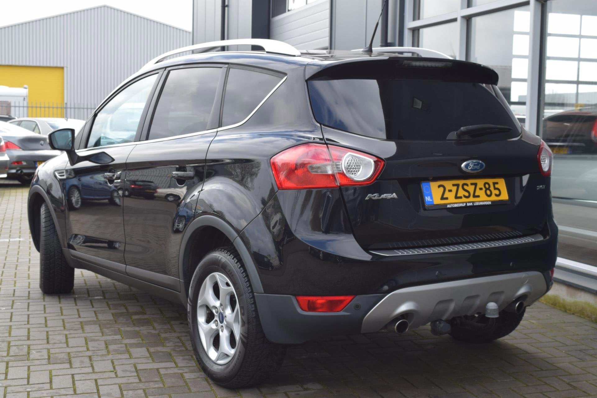 Ford Kuga 2.5 20V Titanium | LPG G3 | Clima | Cruise | Navi, Auto's, 1557 kg, Gebruikt, Zwart, 2510 cc