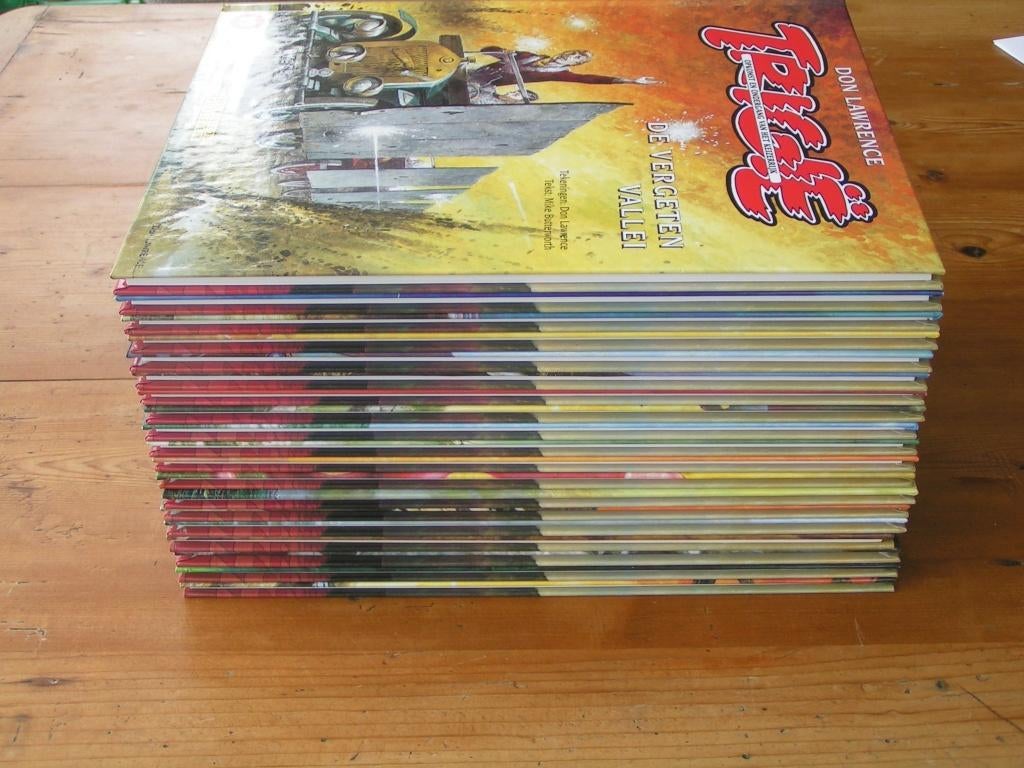 Trigië ~ Complete serie hardcovers 1 t/m 19 [gesigneerd], Complete serie of reeks, Ophalen of Verzenden, Zo goed als nieuw, Don Lawrence