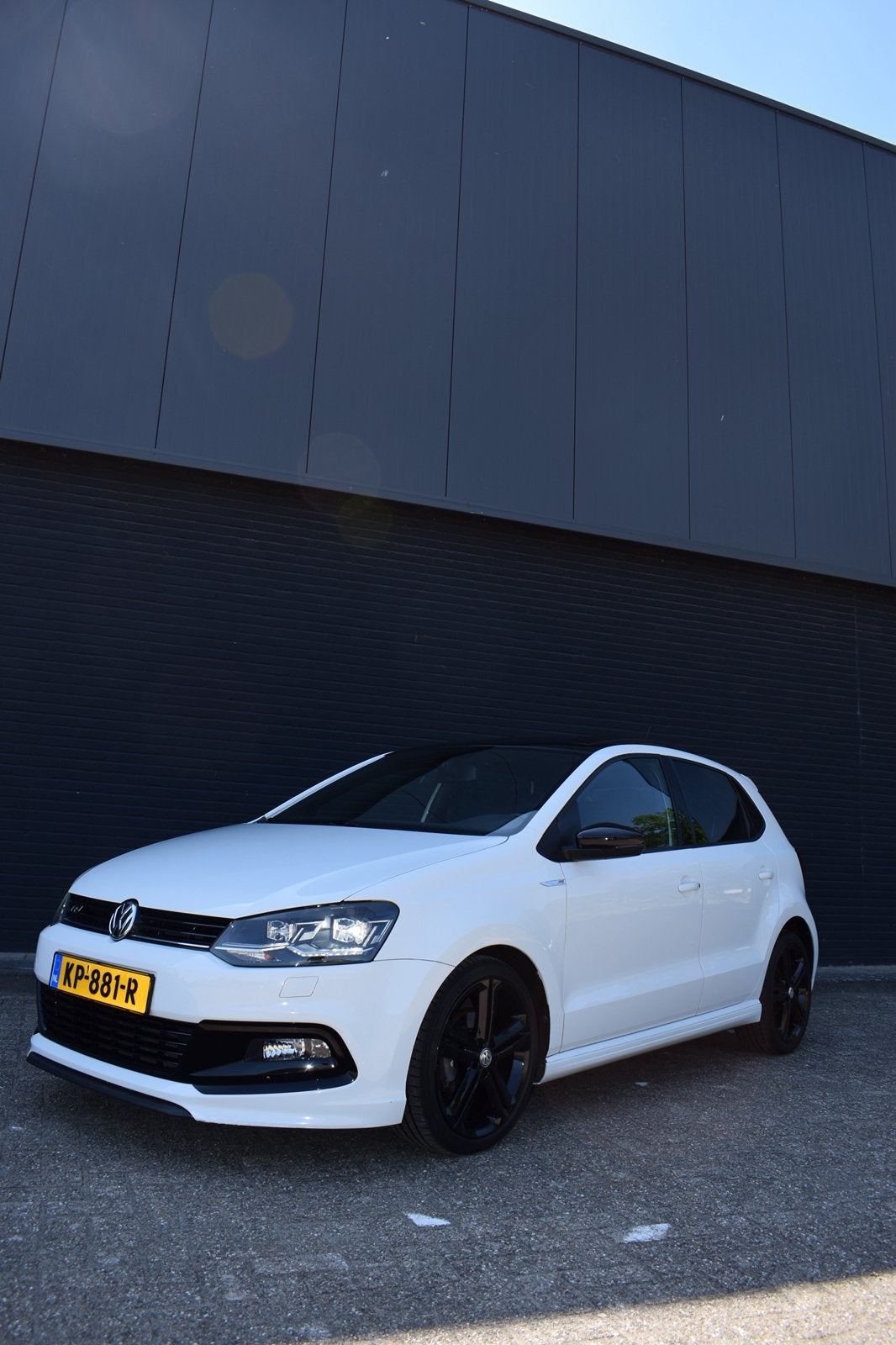 VW Polo 1.2 TSI DSG 2016 Highline 3xR-line Panorama | Sport+, Auto's, Volkswagen, Stof, 40 €/maand, Zwart, 4 cilinders
