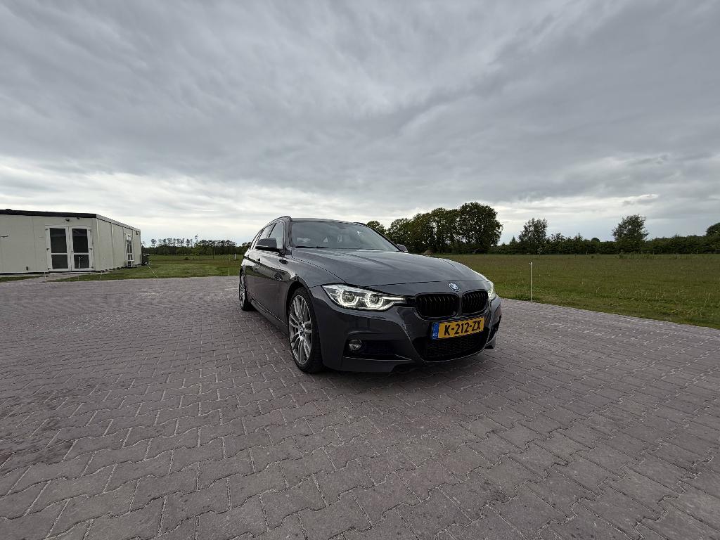 BMW 3-Serie 320d 190pk Aut 2017 Grijs, Auto's, Automaat, 745 kg, Achterwielaandrijving, Zwart