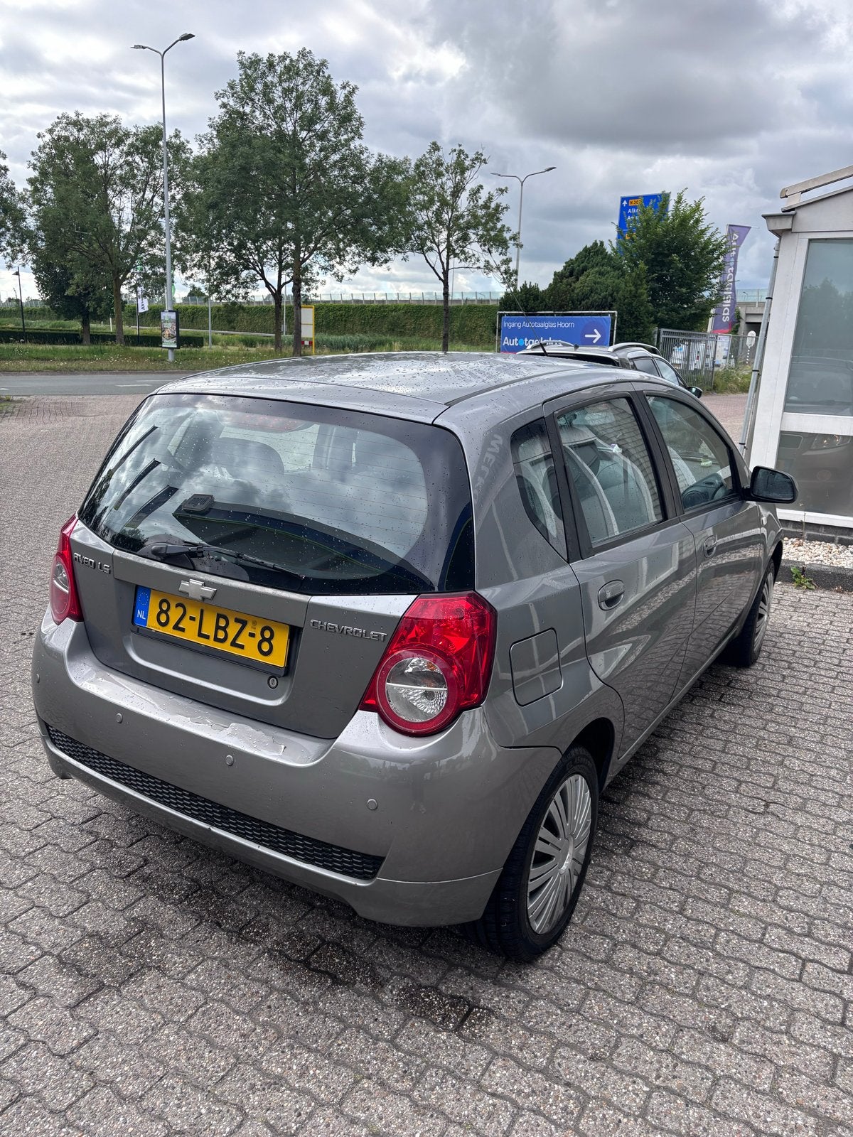 Chevrolet Aveo 1.2 16V 5D 2010 Grijs, Auto's, Voorwielaandrijving, 40 €/maand, Aveo, 4 cilinders
