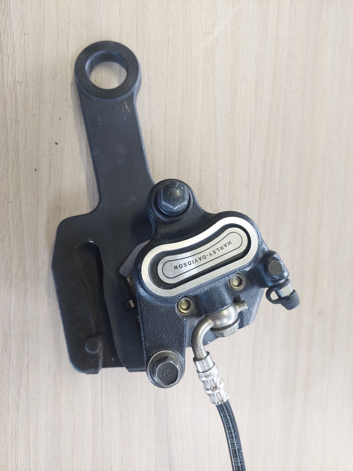 Achterremklauw harley softail 2019 and up, Motoren, Ophalen of Verzenden