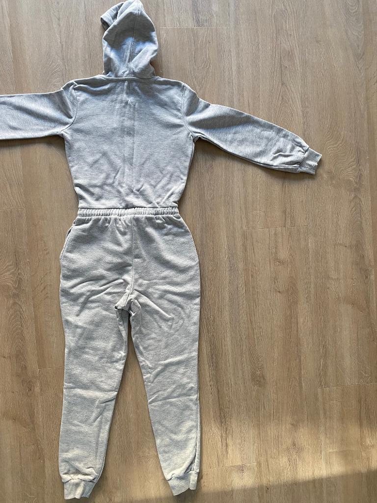Onesie Jumpsuit Joggingstof | grijs | capuchon | mt XS (176), Ophalen of Verzenden, Zo goed als nieuw, Maat 34 (XS) of kleiner