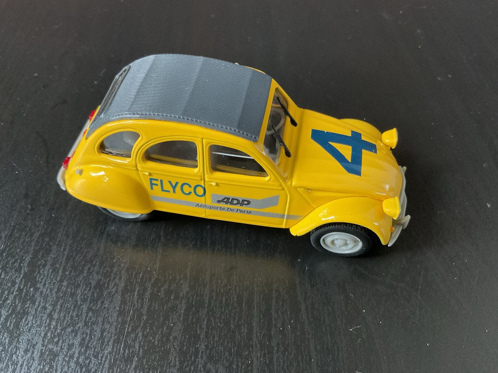 Norev, Hachette, Gele Citroën 2CV modelauto 'FLYCO ADP', Hobby en Vrije tijd, Ophalen of Verzenden, Zo goed als nieuw, Auto, Overige merken