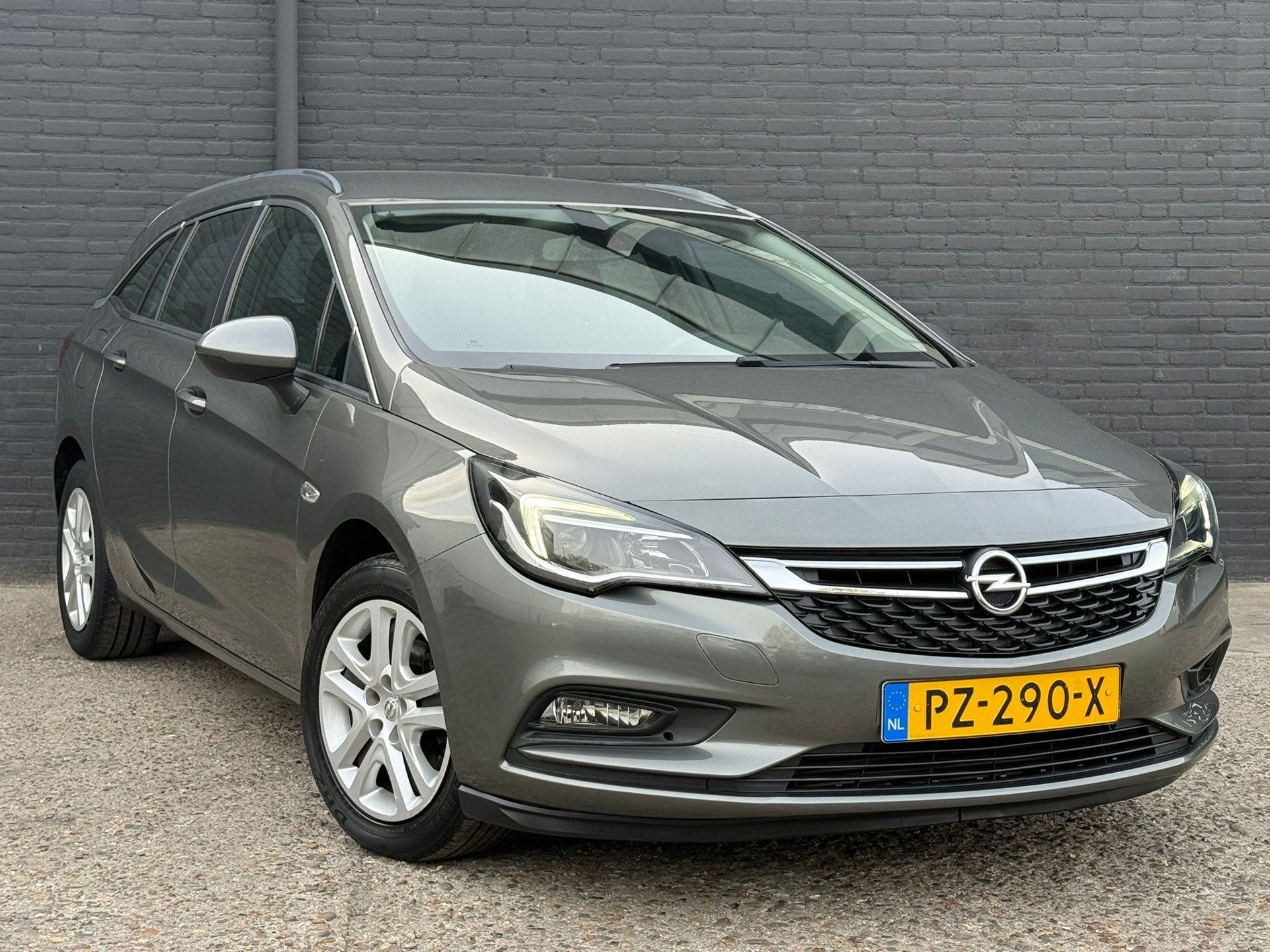 Opel Astra Sports Tourer 1.0 Business+ CARPLAY|NAVI|PDC|TREK, Auto's, Voorwielaandrijving, Stof, Gebruikt, Euro 6