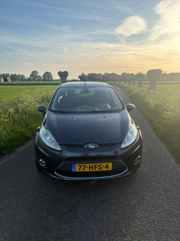 Ford Fiësta 1.25 60KW 5DR 2008 Grijs, Voorwielaandrijving, Stof, Origineel Nederlands, Handgeschakeld