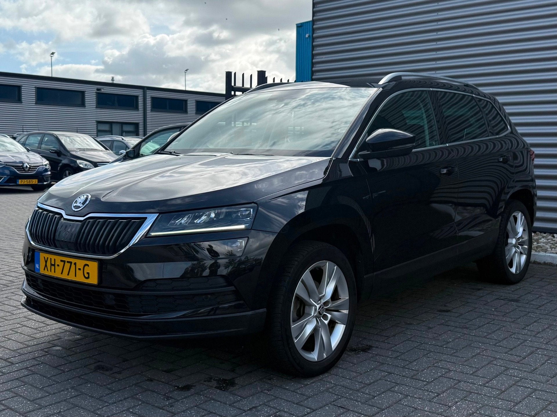 Skoda Karoq 1.0 TSI Style Business, Auto's, Gebruikt, 1261 kg, 116 pk, Zwart