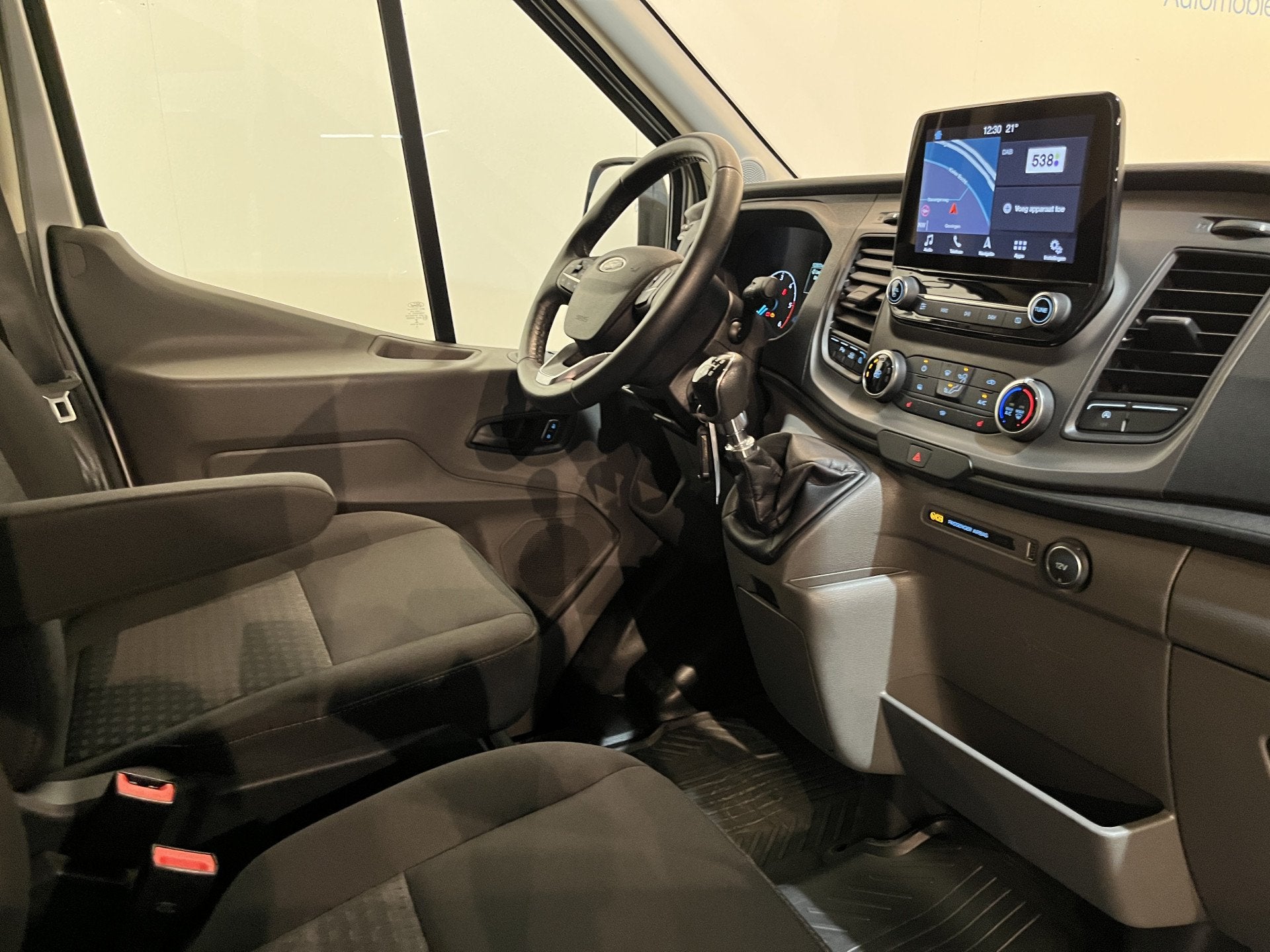 Ford Transit 350 2.0 TDCI L2H2 Trend 130 PK / Euro 6 / Airco, Auto's, Voorwielaandrijving, Stof, 4 cilinders, Met garantie (alle)