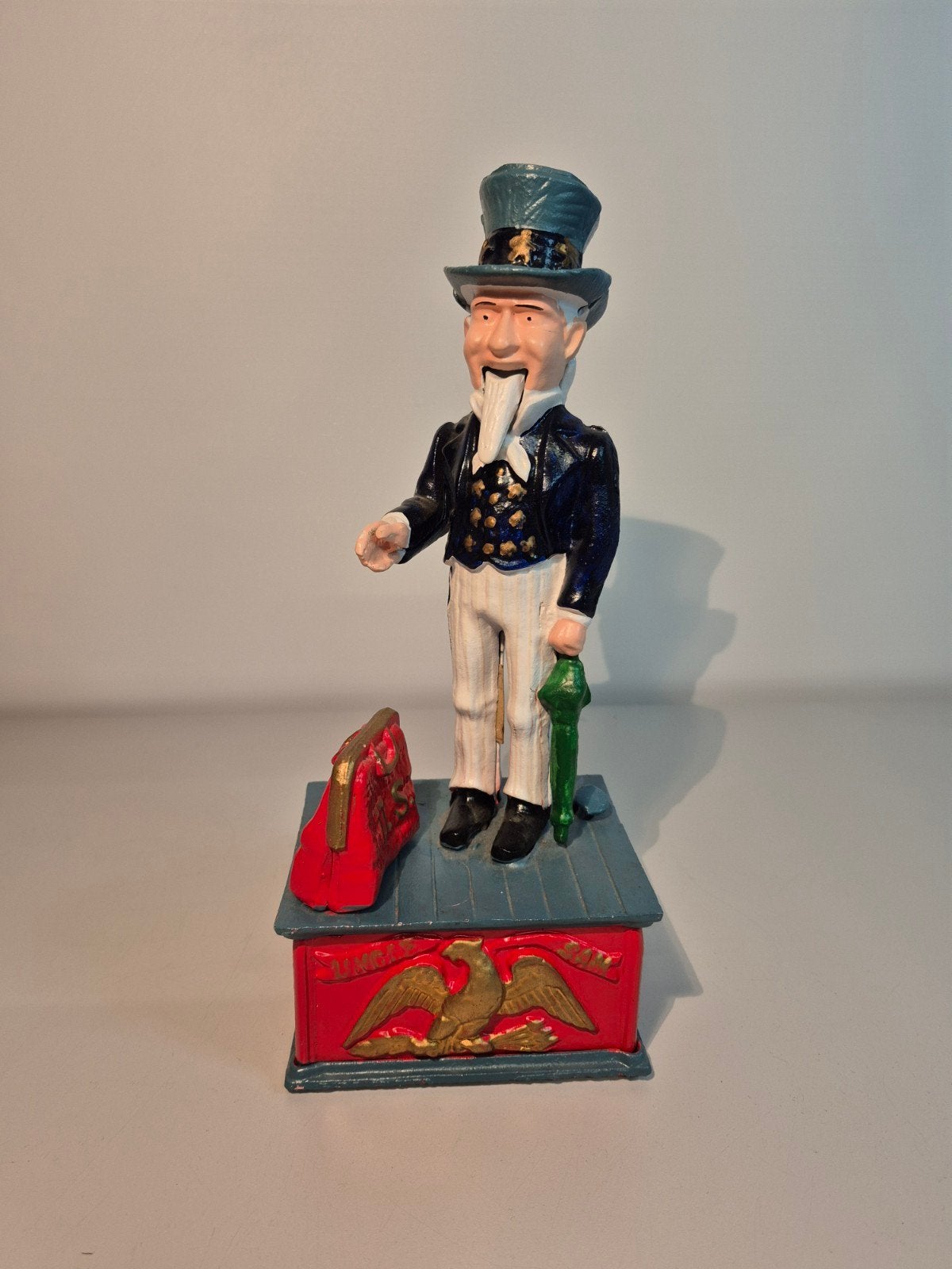 Vintage gietijzeren uncle Sam mechanische spaarpot, Verzamelen, Spaarpotten, Strip- of Tekenfilmfiguur, ., Ophalen of Verzenden