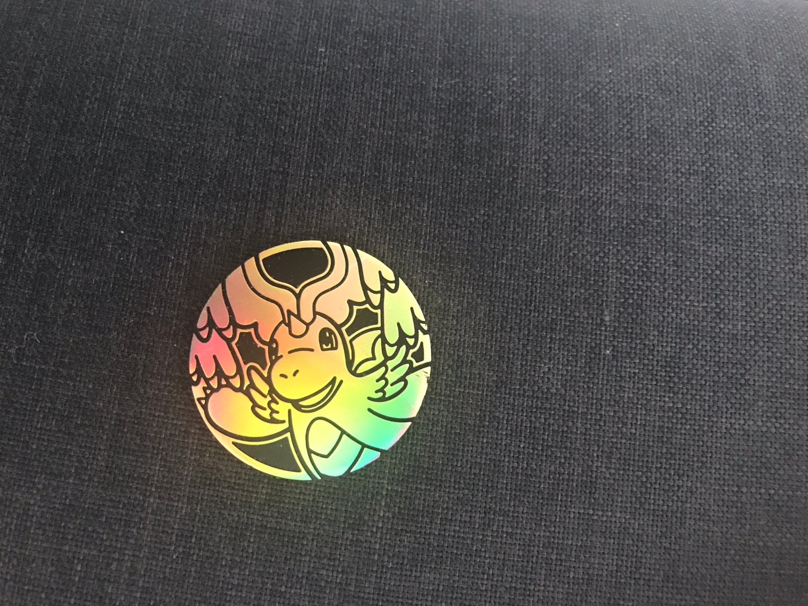 Holografische Pokémon munt - Dragonite, Ophalen of Verzenden, Zo goed als nieuw, Overige typen, Foil