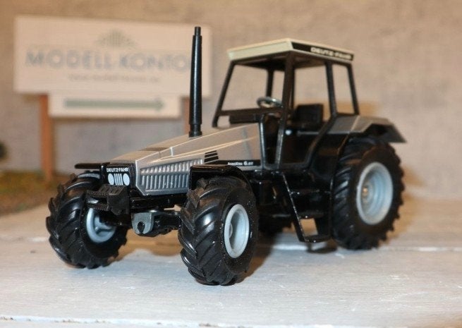 Gezocht: Grijze Deutz 6.07 Agroxtra / Siku, Ophalen of Verzenden, Zo goed als nieuw, Tractor of Landbouw, SIKU