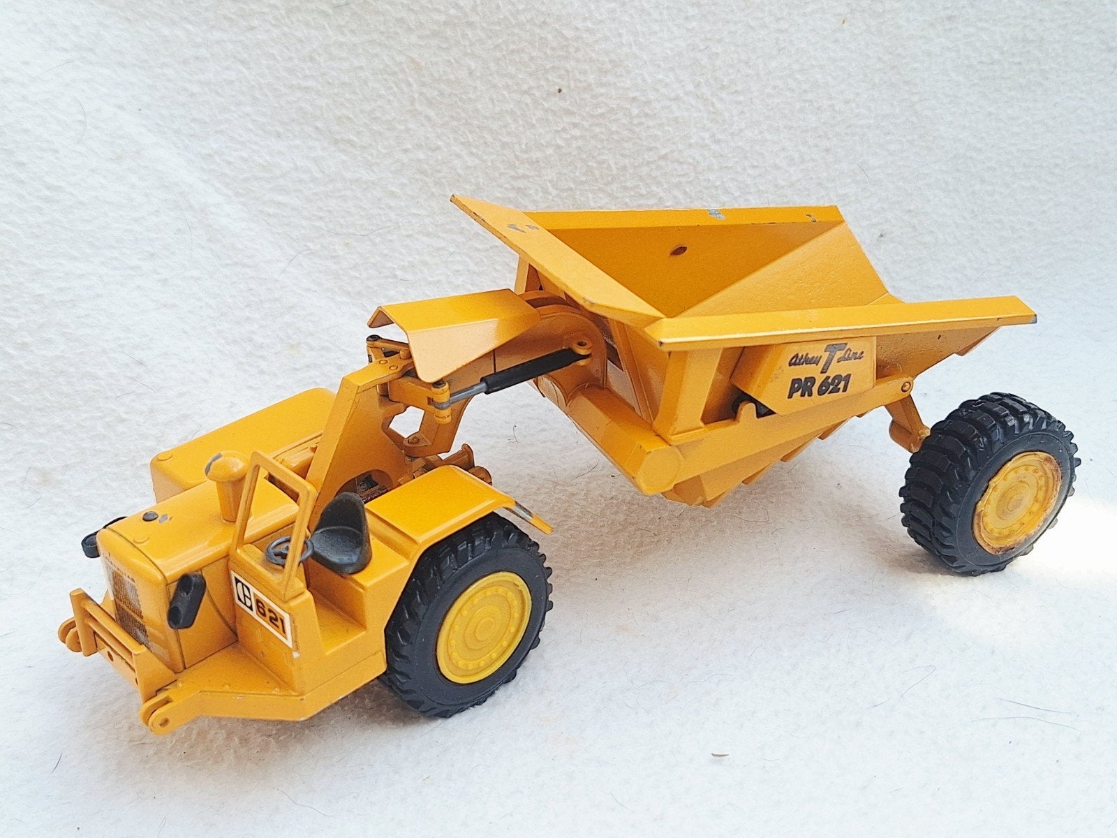 NZG Modelle Caterpillar PR 621 Scraper " Athey T Line ", Ophalen of Verzenden, Gebruikt, Hijskraan, Tractor of Landbouw, NZG