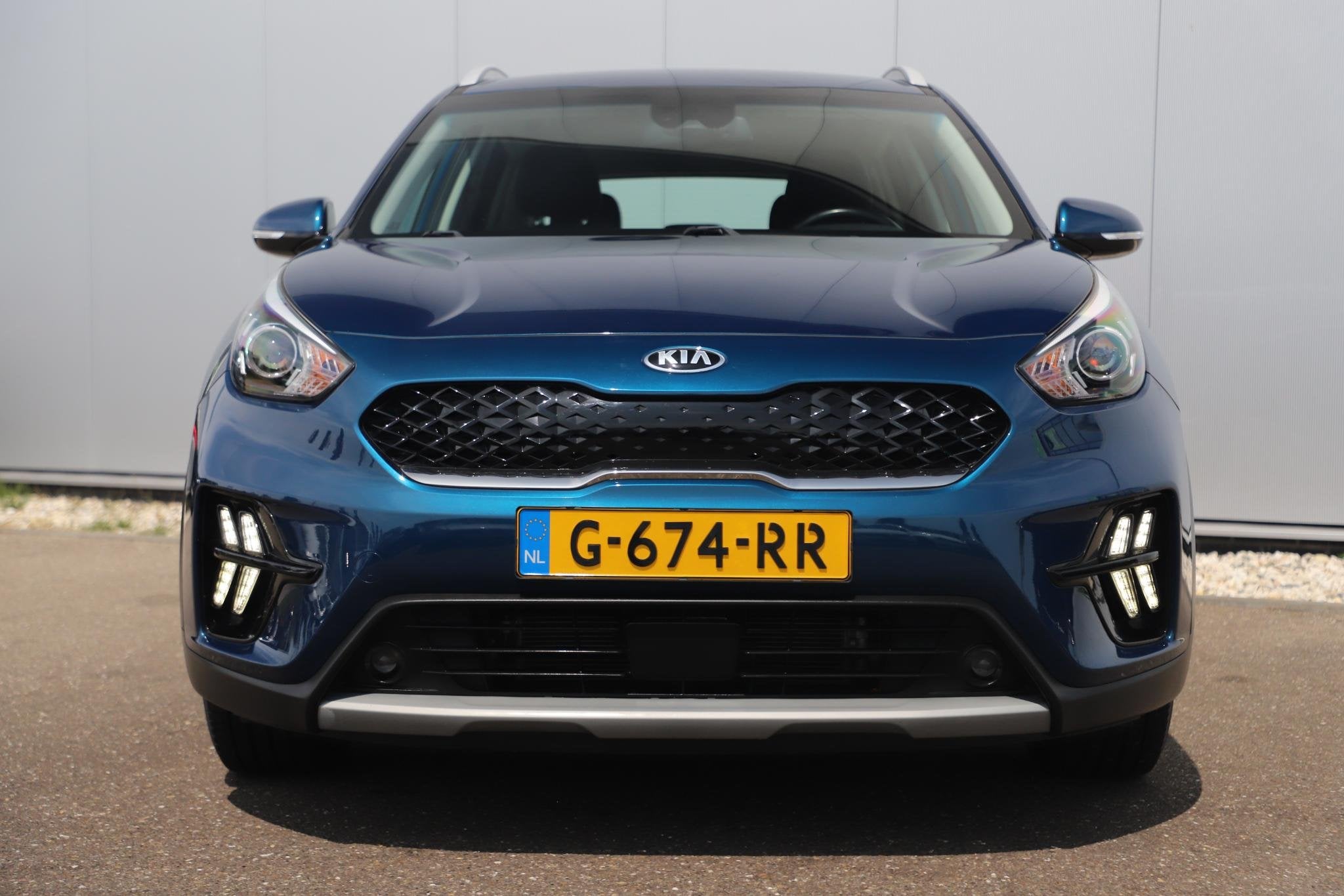 Kia Niro 1.6 GDi Hybrid DynamicLine Automaat Half Leder Navi, Auto's, Kia, Gebruikt, Euro 6, Blauw, Leder en Stof