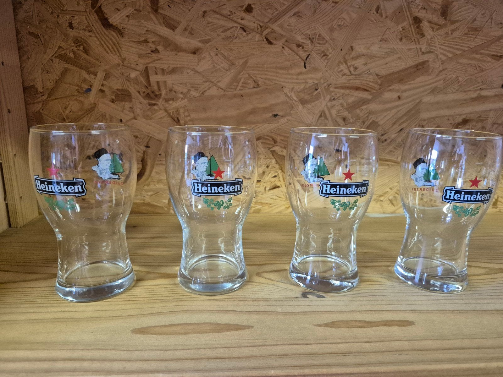 Set van 4 Heineken Zuiderzee glazen in goede staat, Ophalen of Verzenden