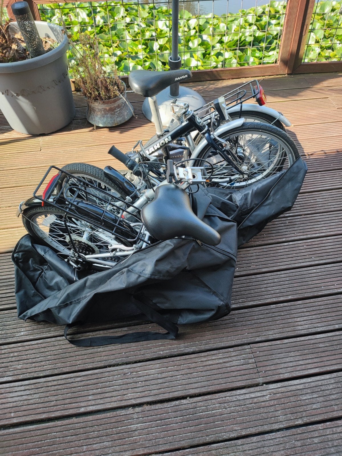 Set vouwfietsen met draagtassen, Ophalen