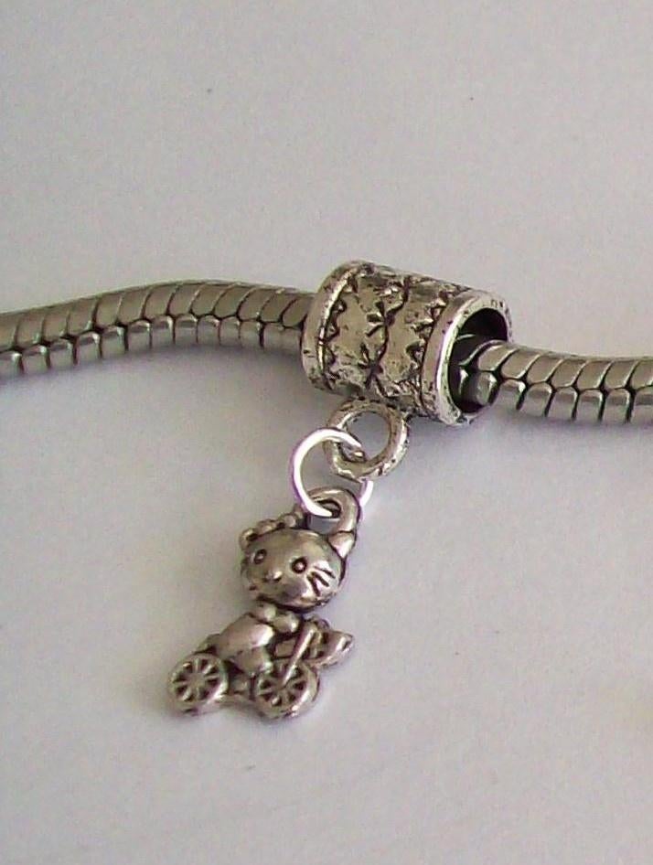 nieuwe zilver bedel/kettinghanger *HELLO KITTY OP FIETS*, Ophalen of Verzenden, Nieuw, Zilver, Overige merken