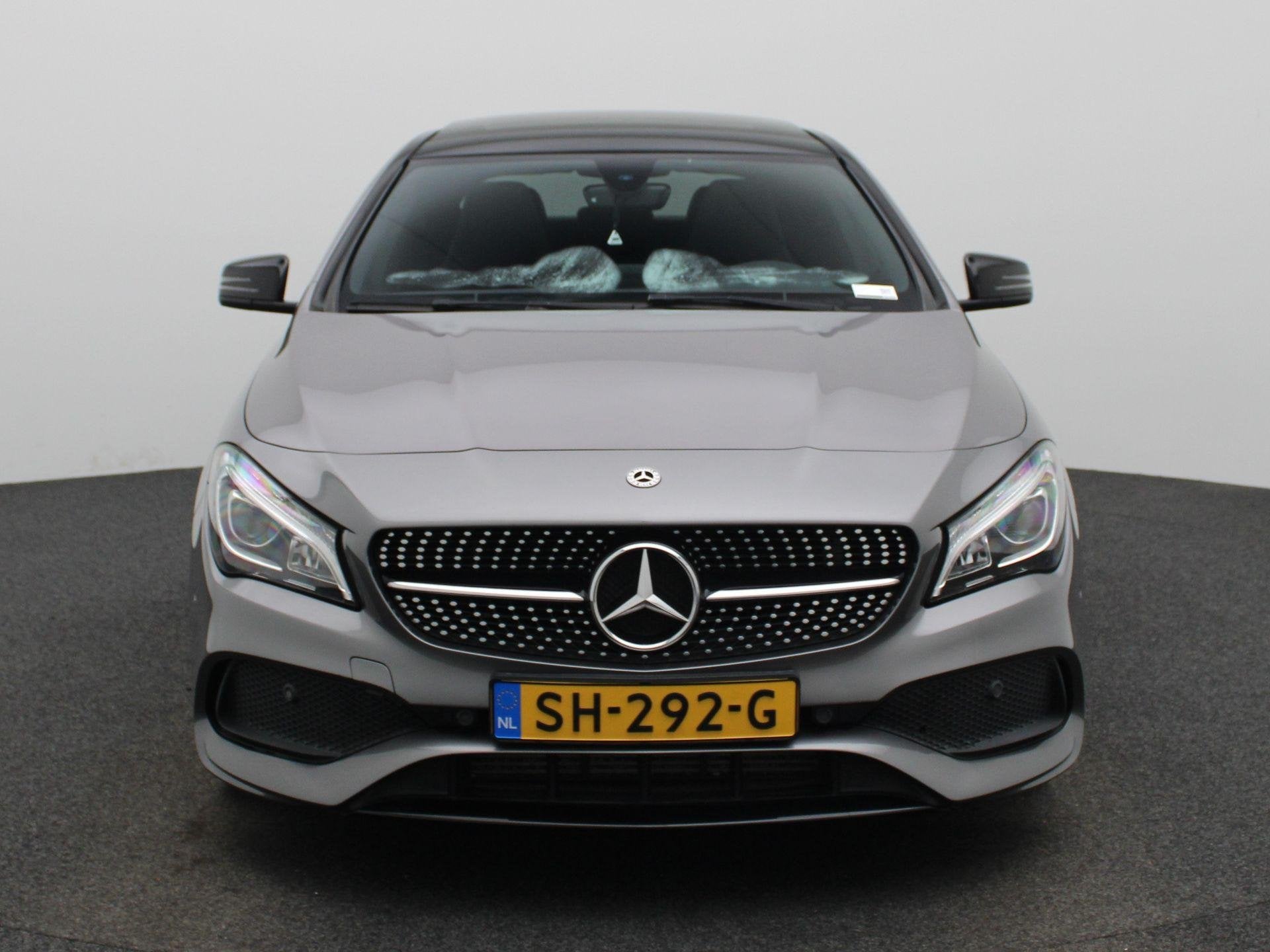 Mercedes-Benz CLA-klasse 180 Prestige | Automaat | AMG-Line, Gebruikt, 4 cilinders, Leder en Stof, 122 pk