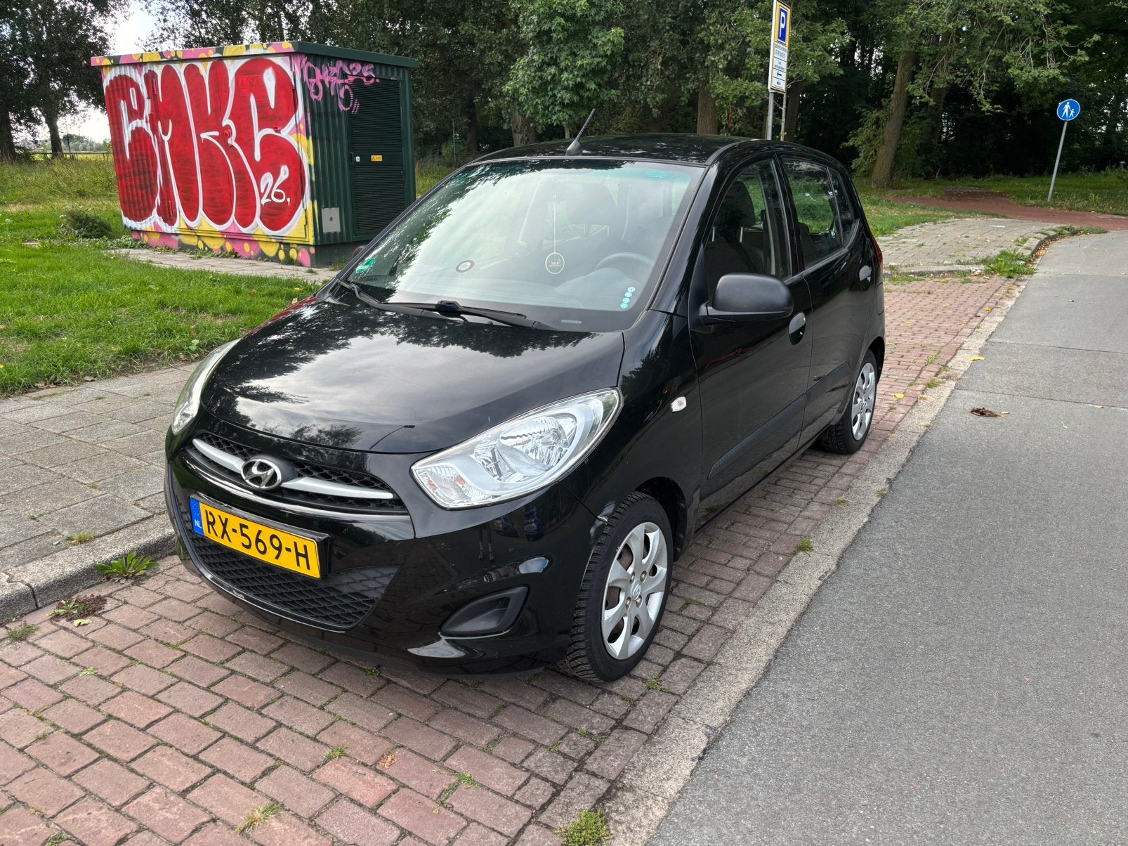 Hyundai i10 1.1 I 5DR 2012 Zwart, Auto's, 880 kg, 4 cilinders, 400 kg, Zwart