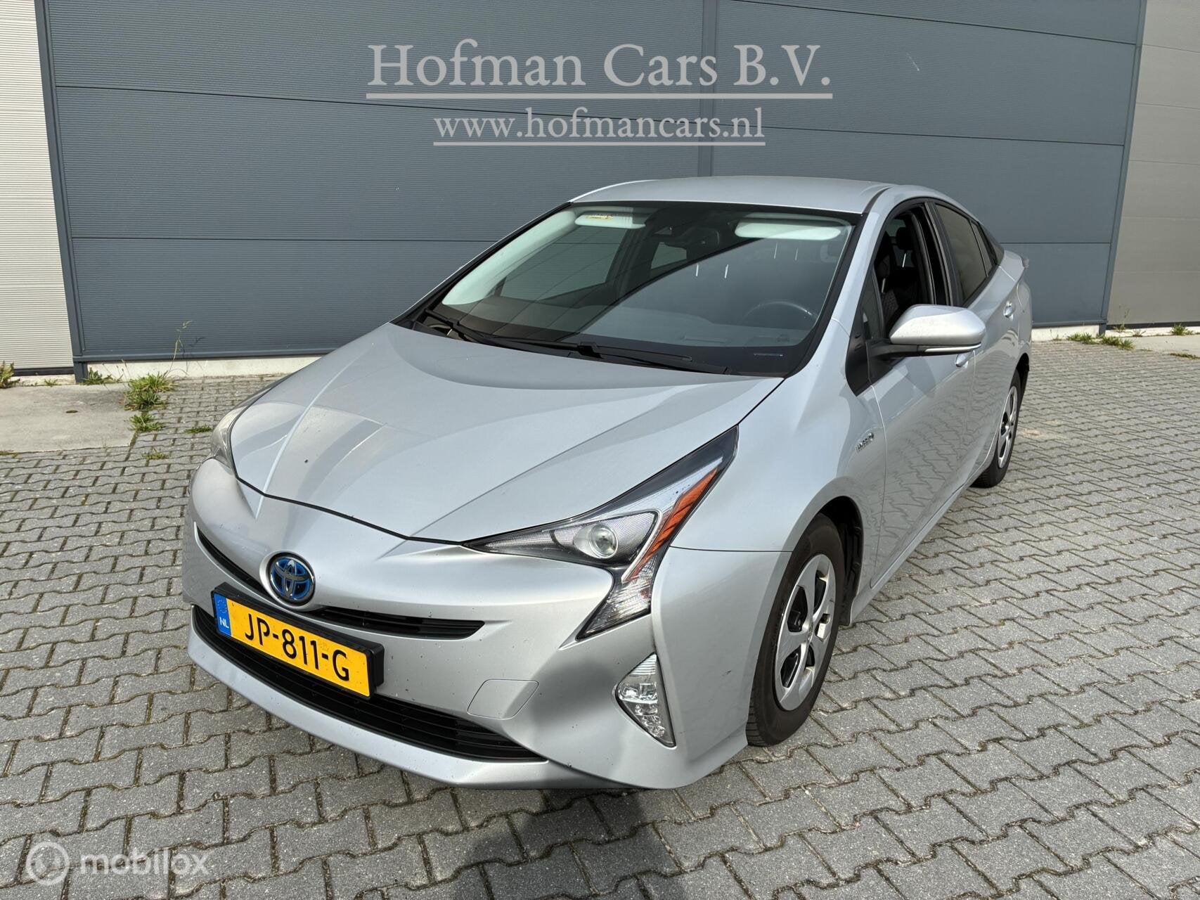 Toyota Prius 1.8 Dynamic | Hybrid | HUD | Navigatie | Lane K, Stof, 122 pk, Bedrijf, Hybride Elektrisch/Benzine