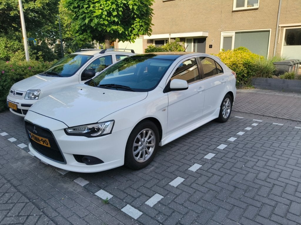Mitsubishi Lancer 1.6 Cleartec Sportback 2014 Wit, Auto's, Mitsubishi, Particulier, Lancer, ABS, Airbags, Airconditioning, Automatische klimaatregeling