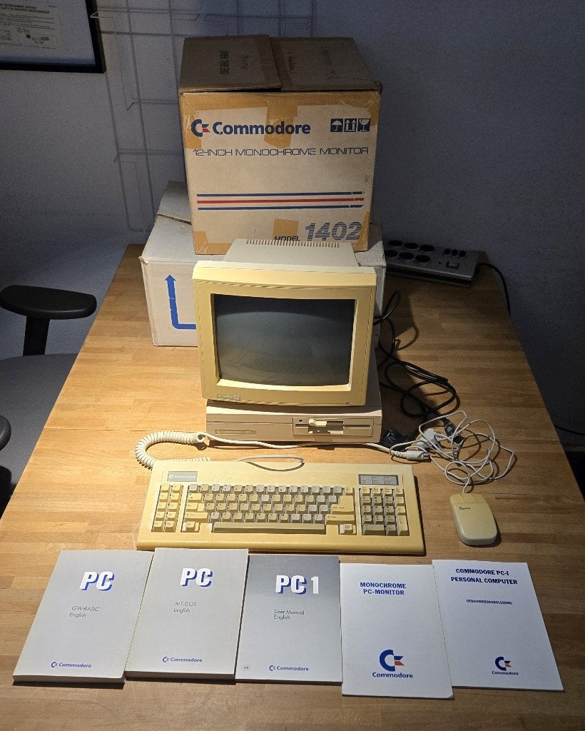 Commodore PC-1 - Commdore Monitor 1402 keyboard/muis boekjes, Computers en Software, Ophalen, Commodore
