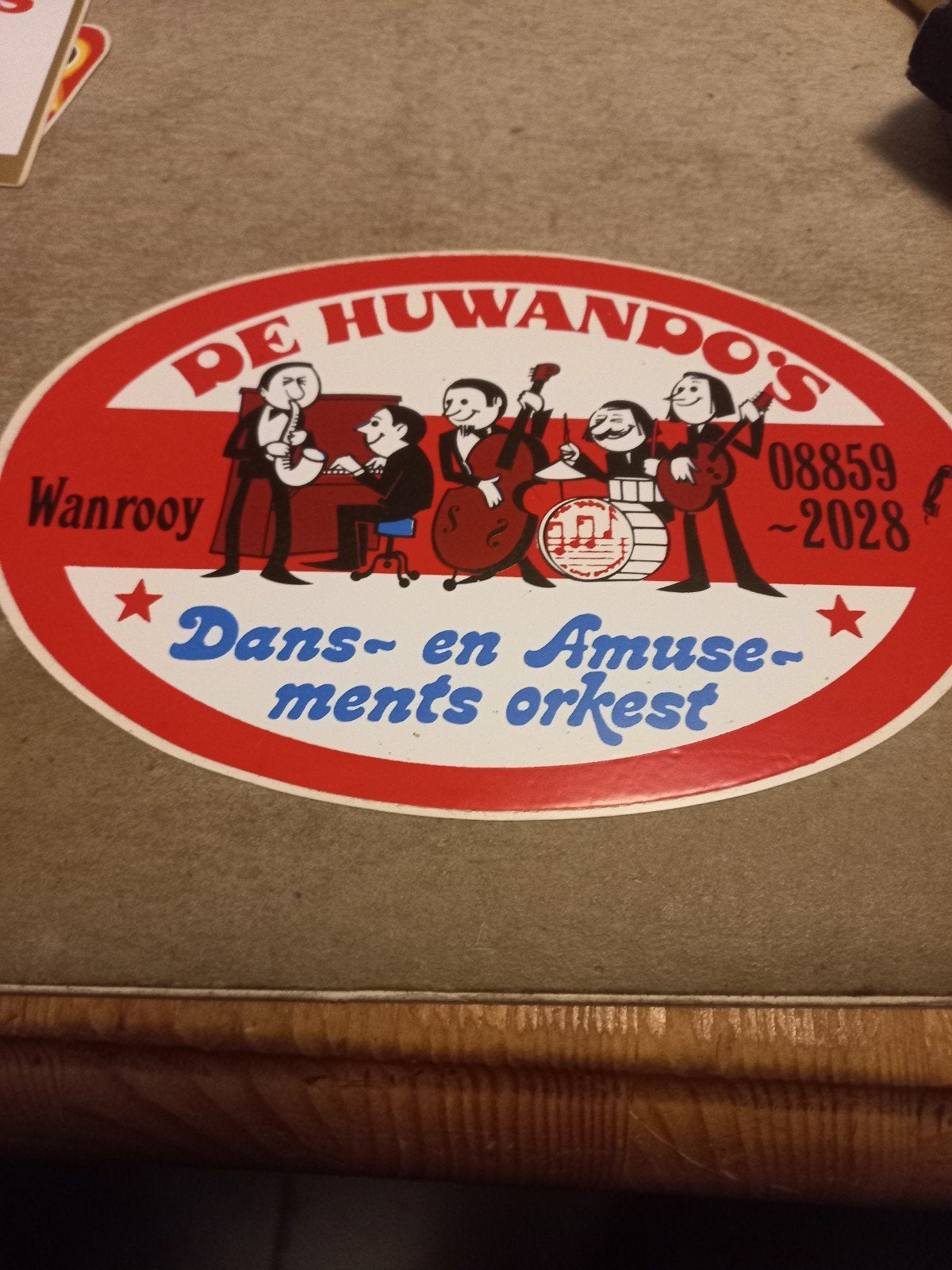 Vintage sticker 'De Huwando's Dans- en Amusementsorkest', Ophalen of Verzenden, Gebruikt