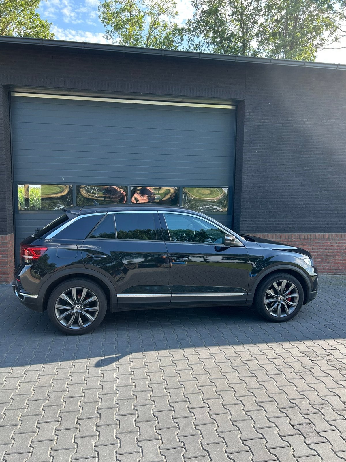 Volkswagen T-Roc 1.5 TSI 150pk 7-DSG 2018 Zwart, 1498 cc, 4 cilinders, Parkeersensor, Zwart