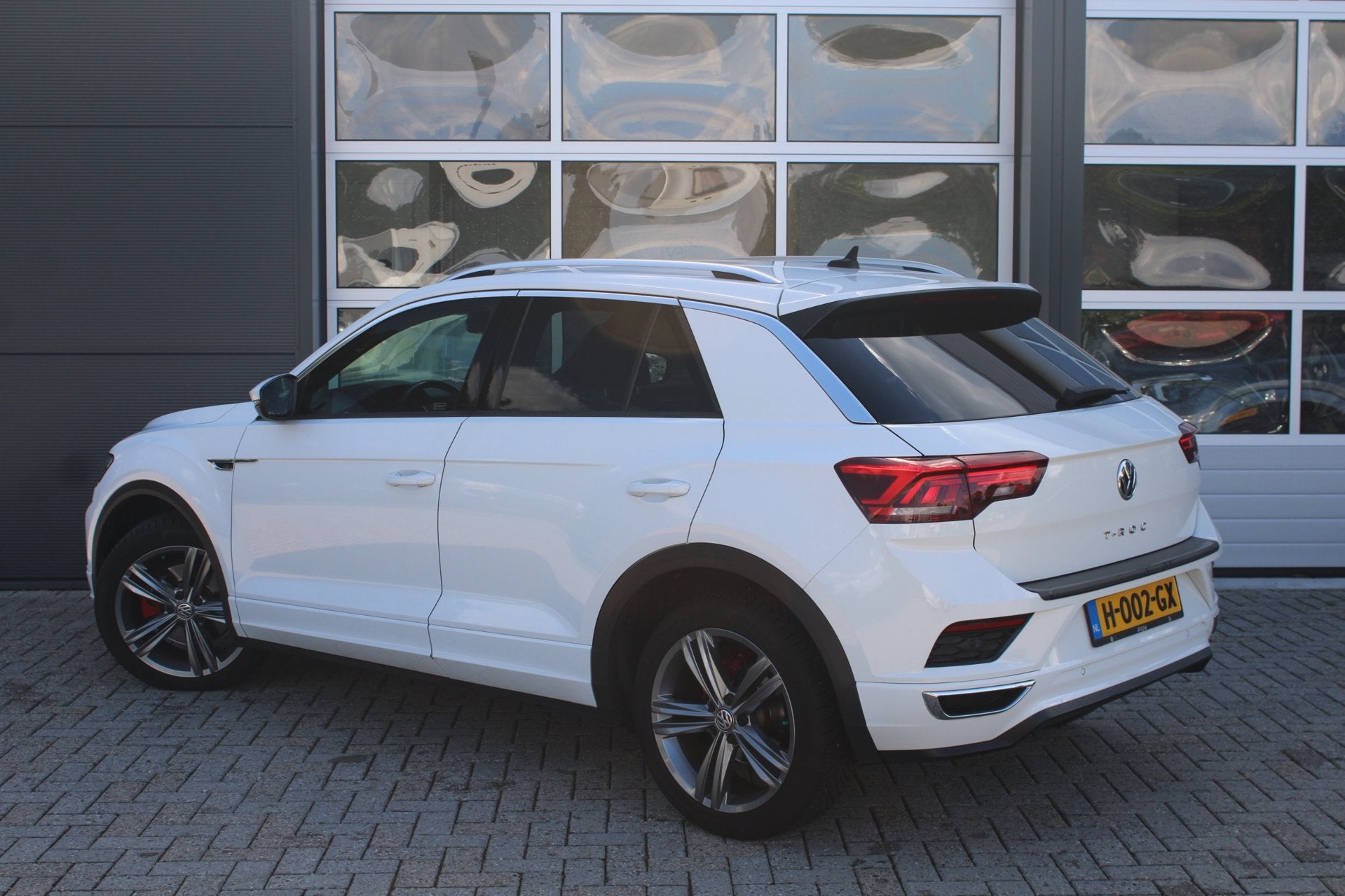Volkswagen T-Roc 1.5 TSI R-Line Org NL | Af. Trekhaak | Virt, Auto's, Volkswagen, 4 cilinders, 150 pk, Alcantara, Wit