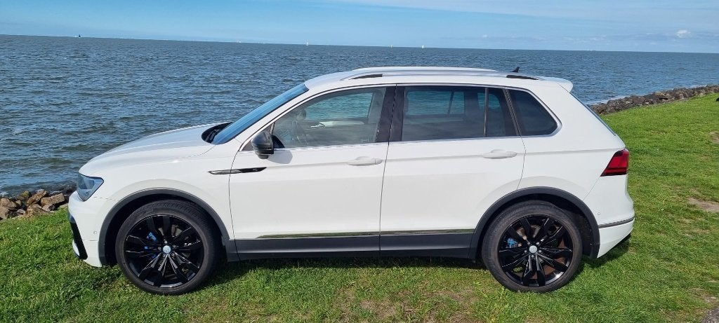 VW Tiguan 1.4 TSI 180pk 4Motion DSG 2018 tuned NAVI Trekhaak, Automaat, Stof, Zwart, 4 cilinders