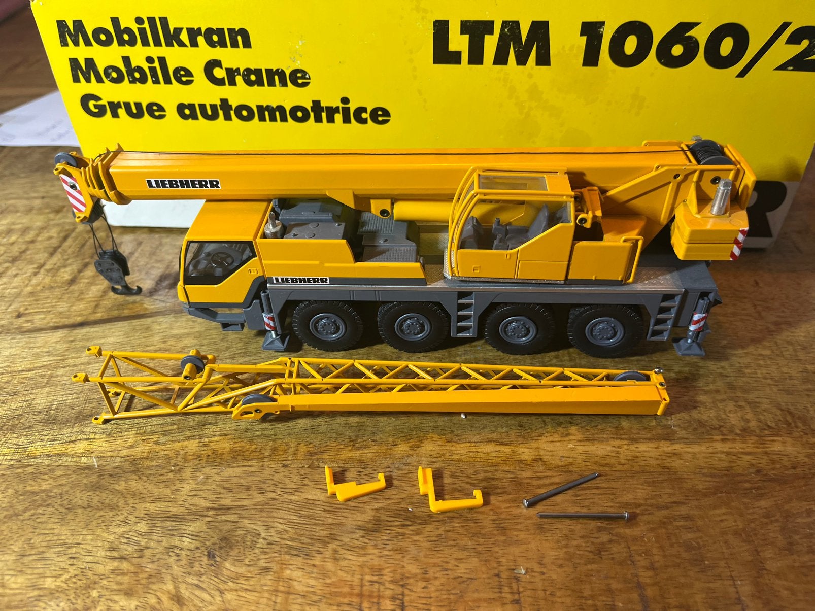 Liebherr LTM 1060/2 nieuw in doos, Hobby en Vrije tijd, Ophalen of Verzenden, Nieuw, Wsi