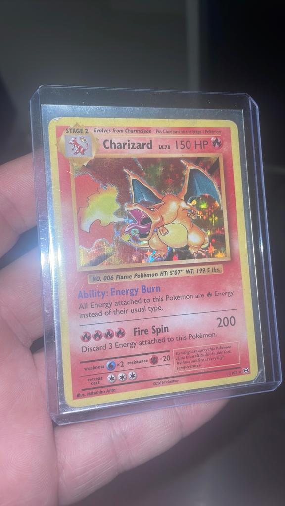 Charizard 11/108 rare holo, Hobby en Vrije tijd, Verzamelkaartspellen | Pokémon, Verzenden, Zo goed als nieuw