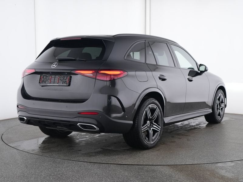 Mercedes-Benz GLC 300 e 4MATIC AMG Plug-In Hybride Airmatic, Auto's, Automaat, 12 maanden, Verwarmde buitenspiegels, Zwart