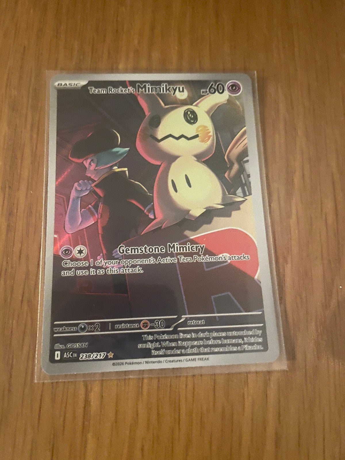 Team Rocket's Mimikyu Pokémon Kaart 238/217, Ophalen of Verzenden, Zo goed als nieuw, Losse kaart