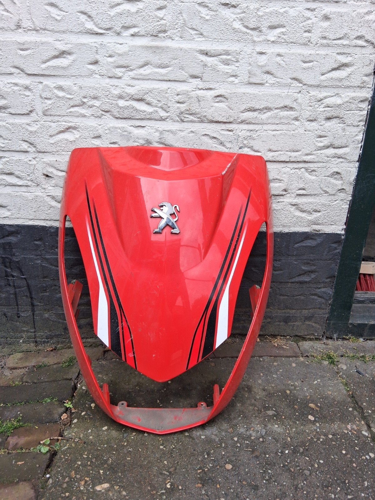 Voorkap Peugeot Kisbee, Ophalen