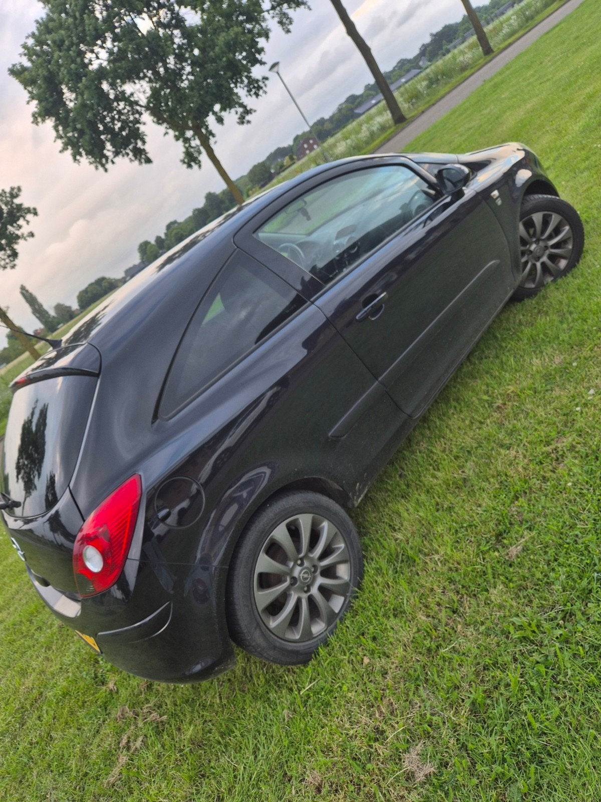 Opel Corsa 1.2 16V 3D 2010 Zwart, Auto's, Opel, Voorwielaandrijving, 450 kg, 40 €/maand, 1229 cc