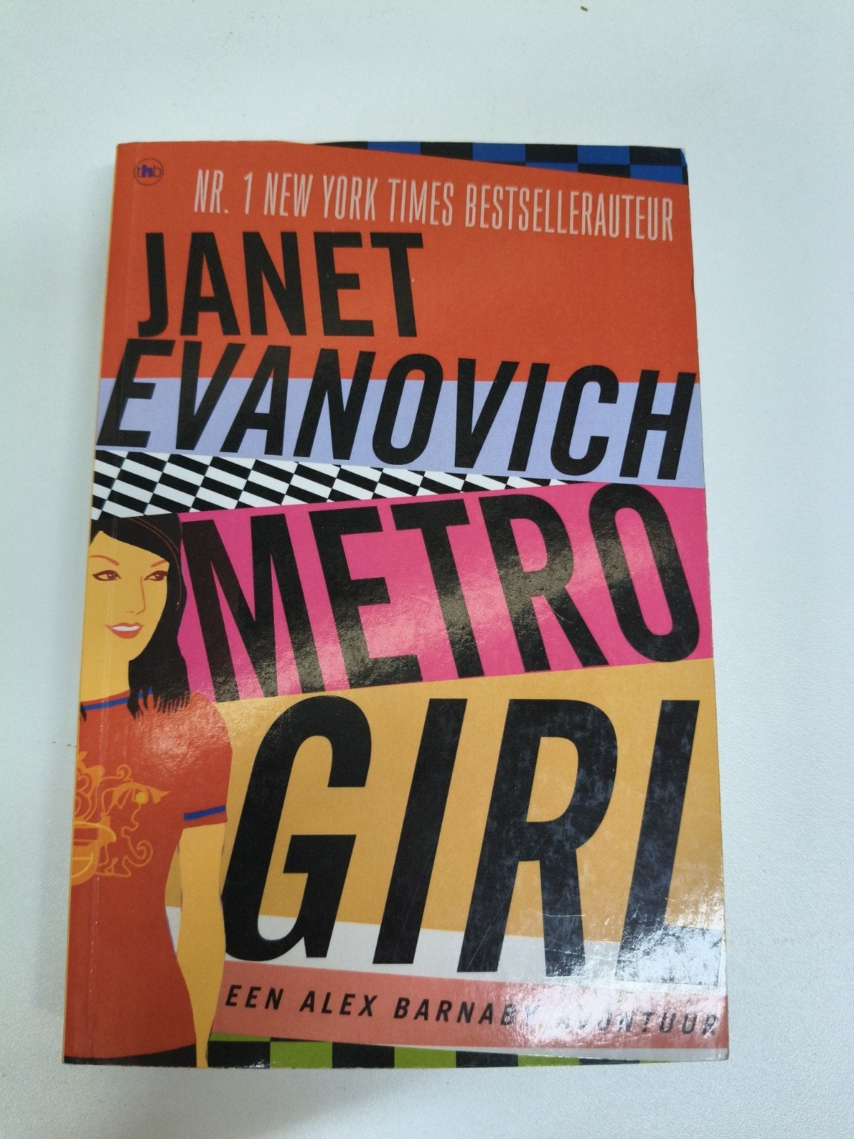 Metro Girl - Janet Evanovich (Paperback), Boeken, Ophalen of Verzenden, Gelezen, Janet evanovich