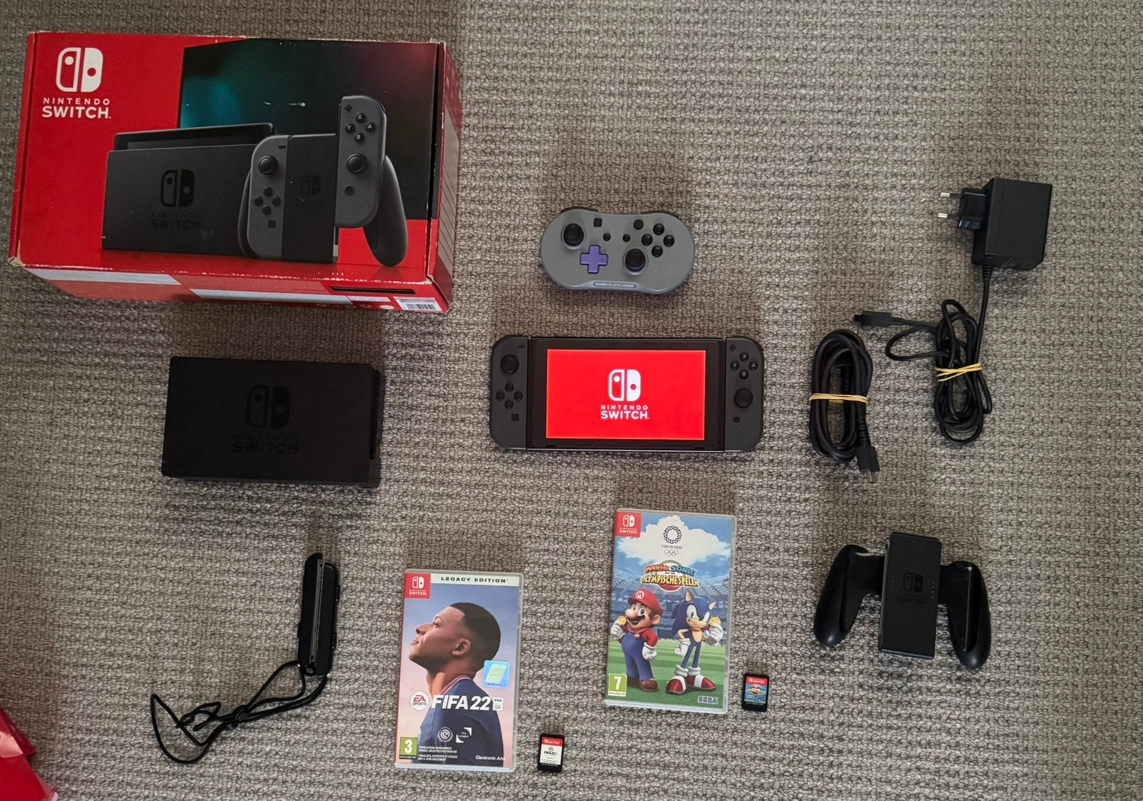 Nintendo Switch V2 + 2 spellen – Absolute nieuwstaat, Spelcomputers en Games, Switch 2019 Upgrade, Met games, Ophalen of Verzenden