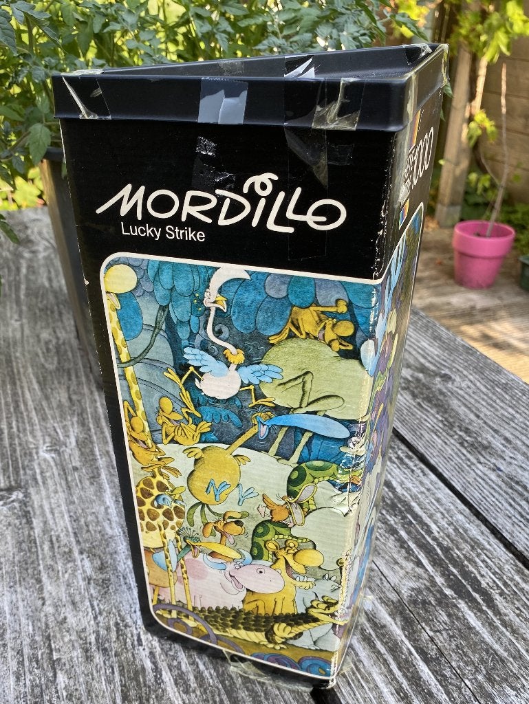 Leuke Guillermo Mordillo Puzzel - Lucky Strike vintage Heye, Antiek en Kunst, Ophalen of Verzenden, Overige typen, Meerkleurig