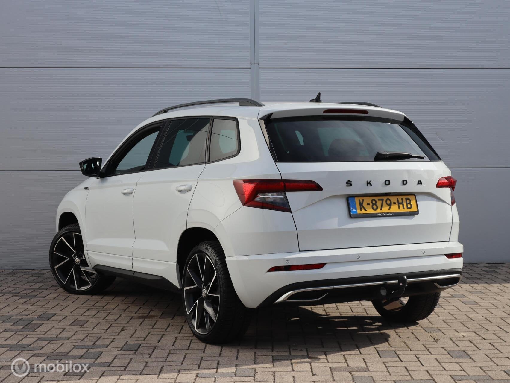 Skoda Karoq 1.5 TSI Sportline Automaat Trekhaak Canton Camer, Auto's, Dealer onderhouden, Stof, 4 cilinders, 150 pk