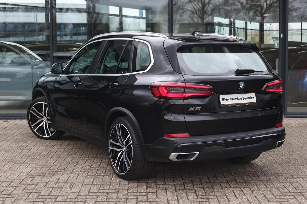 BMW X5 xDrive45e Executive Automaat / Sportstoelen / Achteru, Gebruikt, 394 pk, Zwart, Vierwielaandrijving