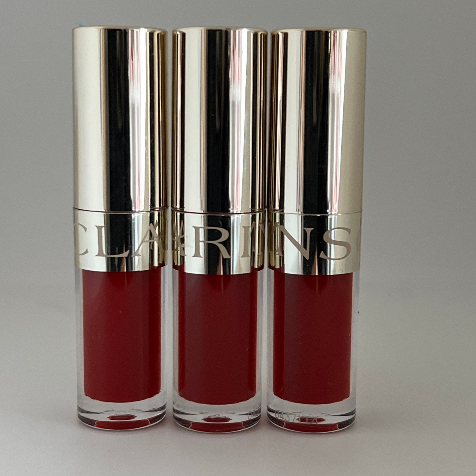 Clarins Lip Comfort Oil Mini #03 Cherry#, Ophalen of Verzenden, Nieuw, Lippen, Make-up