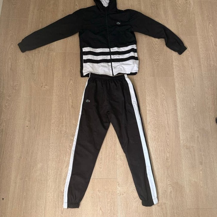 Lacoste trainingspak zwart/wit - Maat S, Kleding | Heren, Sportkleding, Zwart, Nieuw, Ophalen of Verzenden, Algemeen