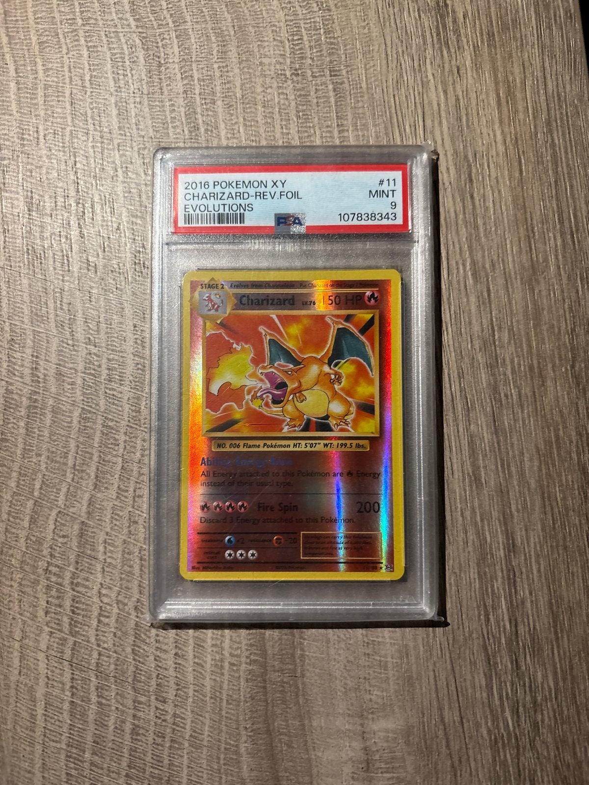 PSA 9 MINT Charizard Reverse Foil Evolutions Pokémon Kaart, Hobby en Vrije tijd, Ophalen of Verzenden, Zo goed als nieuw, Losse kaart